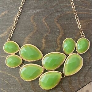 Gold tone metal Statement necklace with Green Stones
